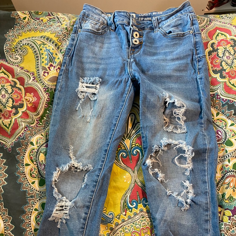 High waisted distressed jeans